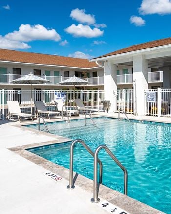 Swimming pool with lounge chairs